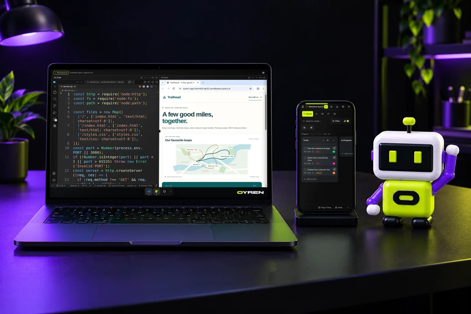 VS Code and a browser in a real Oyren Codespace on a laptop, its board on a phone and the Oyren mascot beside them (concept photo)